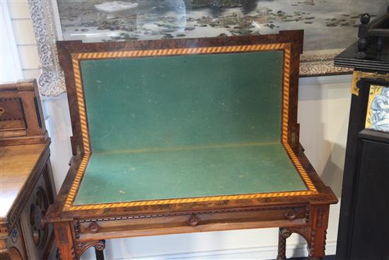 A Victorian Gothic revival walnut and marquetry rectangular card table, in the manner of Lamb of Manchester, W.3ft 2in.